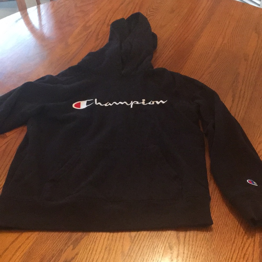 Boy’s Hooded sweat shirt by Champion.